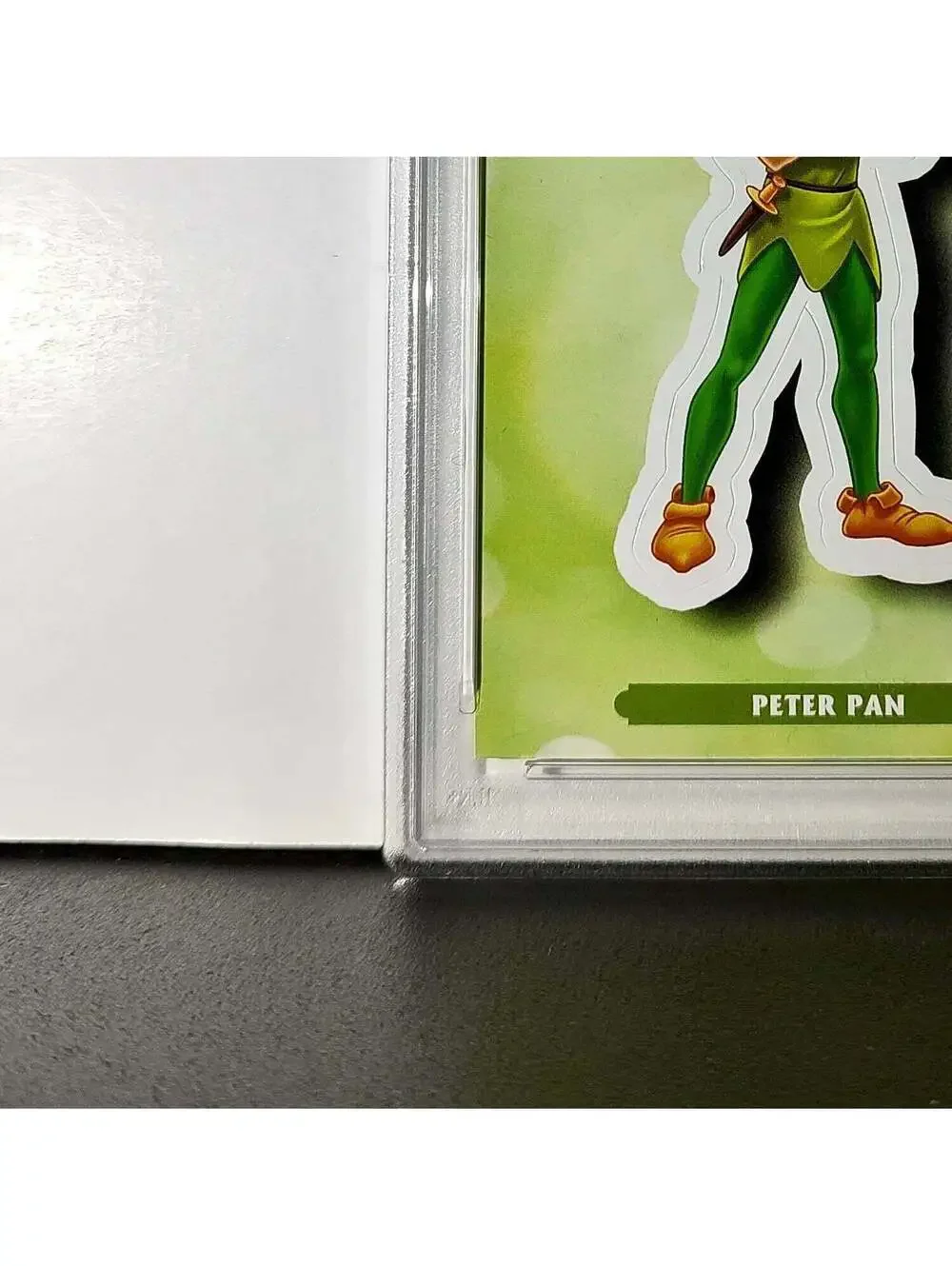 Peter Pan 2025 Topps Disney #ES-8 Enchanted Sticker Card Peter Pan PSA 9